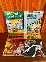 Front view of all four Asterix graphic novels