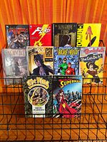 All ten graphic novels displayed on rack