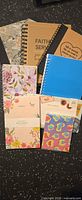 All notebooks, notepads and sticky notes laid out