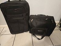 Exterior view of suitcase and insert bag side by side