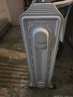 Top view showing six white fins and end cap