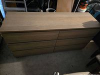 Front view of six-drawer dresser