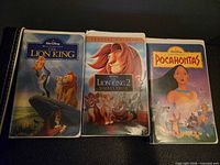 Front covers of the three Walt Disney VHS tapes