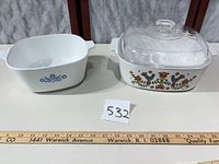 Both 4-qt casseroles side by side with ruler for scale, Cornflower left, Butterprint with lid right