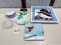 All six serving pieces arranged on table