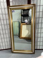 Full frontal view of mirror standing upright