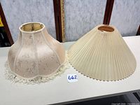 Both lamp shades side-by-side showing overall forms and color