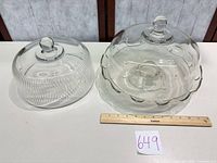 overview of cake stand and two domes with ruler for scale