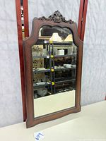 Full view of mirror front showing frame and glass