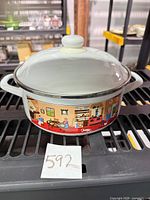 Stockpot with lid front view showing pattern and handles