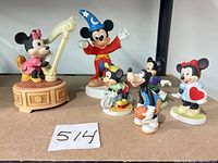Group shot of all six Disney ceramic figurines