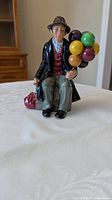 Front view of Royal Doulton The Balloon Man figurine