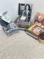 Overview of three CD stacks showing variety of albums