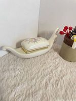 Full view of hinged jewellery box left side