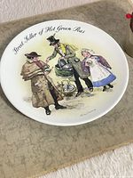 Full view of Wedgwood plate showing illustration and text