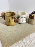 Front view of both mugs side by side