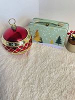 tin box and ornament candy jar grouped