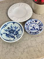 Three mini plates showing overall designs