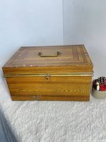 Top and side view of tin storage box