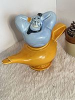 Genie shaker seated on lamp shaker showing overall design