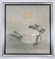 Full view of framed embroidered silk panel