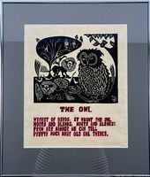 Full view of framed woodcut showing image, poem text, mat and frame