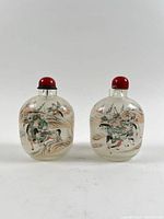 Two reverse painted snuff bottles front view