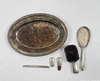 Group shot of all six silver items