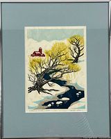 Framed woodcut print showing entire image within mat and frame