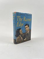 Book standing showing full dust jacket spine and front