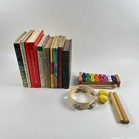 Group shot of all books, xylophone, tambourine, shakers and rhythm sticks