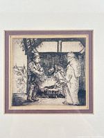 Close-up of etching showing nativity scene and matting