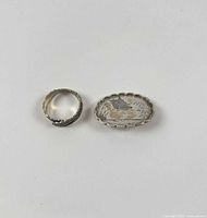 Ring and brooch together, scale reference