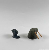 Front view of both soapstone carvings