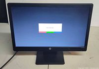 Powered-on front view showing screen with message