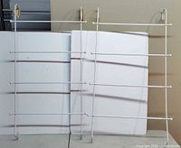 Both white steel racks front view