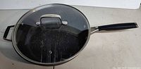 Top view of frying pan with lid on