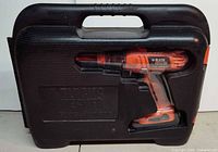 Drill stored in closed molded case