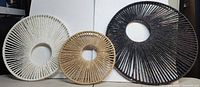 All three wicker circle wall hangings side by side