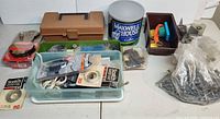 Overall view of lot with toolboxes, storage bins, bags of hardware, USB cable package visible