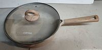 Top view of frying pan with lid on