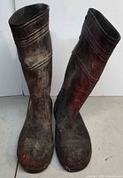 front view of both boots showing height, toe wear and grime