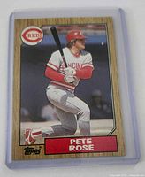 Front view of 1987 Topps Pete Rose card in plastic sleeve