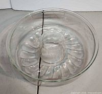 Top view of clear glass fluted tube cake pan