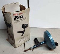 Drain cleaner and original box side by side