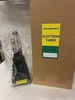 Amperex electron tube in clear bag beside original carton