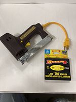 Electric staple gun and box of staples overview