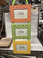 Front view of three connected frames showing colors and design