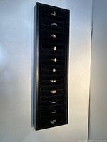 vertical display tray showing all 11 rings