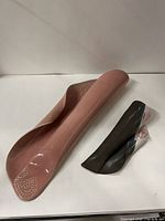 both Hilborn Pottery wall hangings side by side showing overall forms and colors